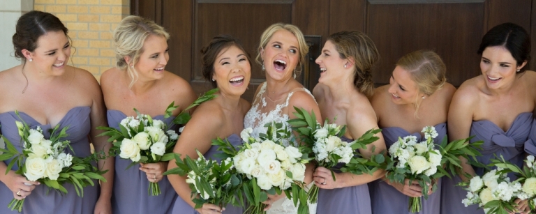 laughing bridesmaids purple gowns