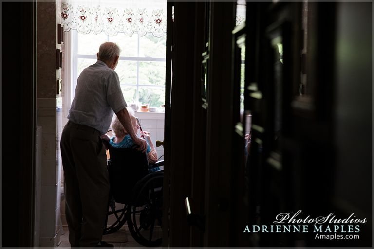 grandfather helping grandmother in bathroom