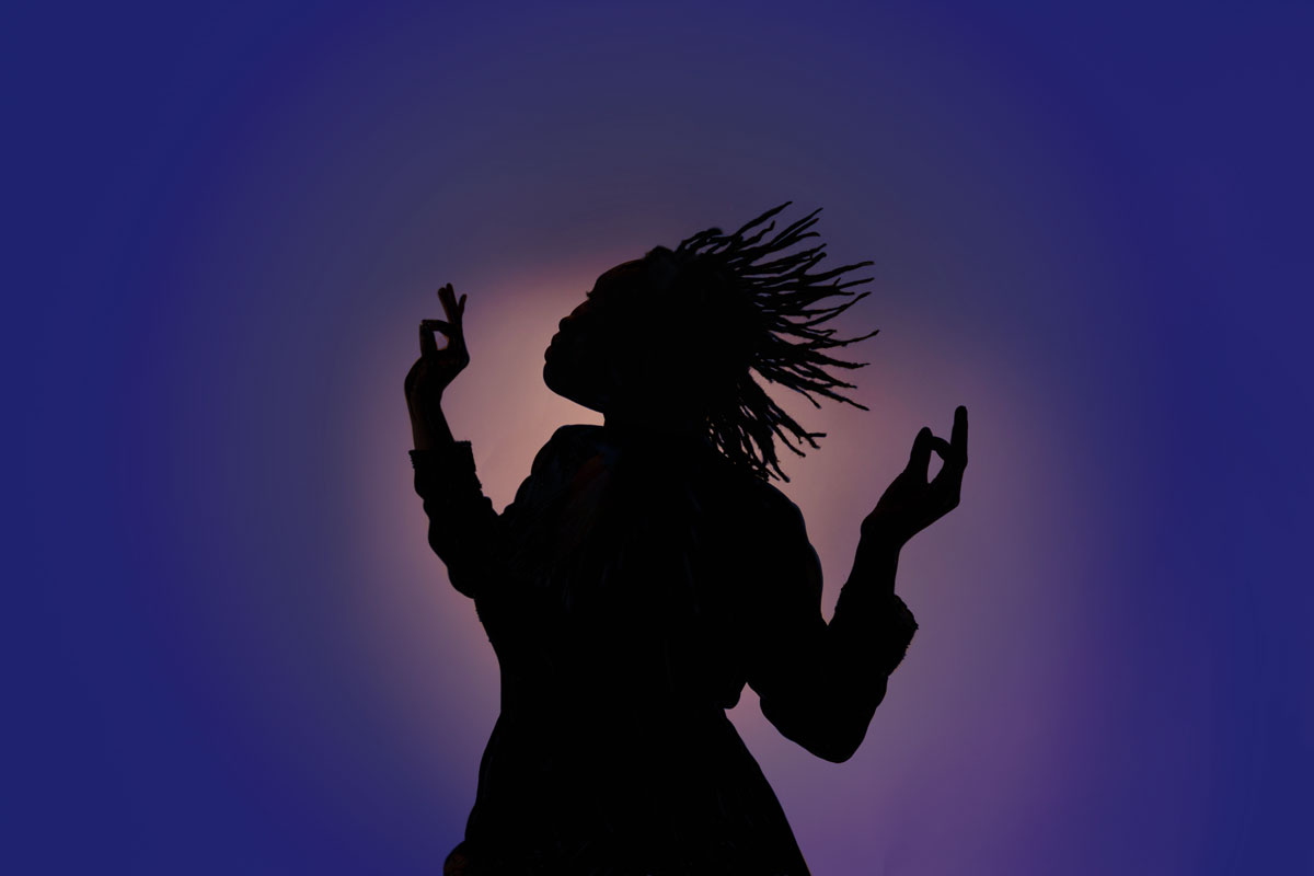 Silhouette black woman dancing